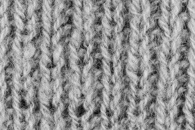 Örgü yün kumaş arka planının beyaz doğal dokusu. Beyaz pamuk kumaş, örülmüş tuval dokusu