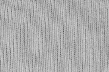 Örgü yün kumaş arka planının beyaz doğal dokusu. Beyaz pamuk kumaş, örülmüş tuval dokusu