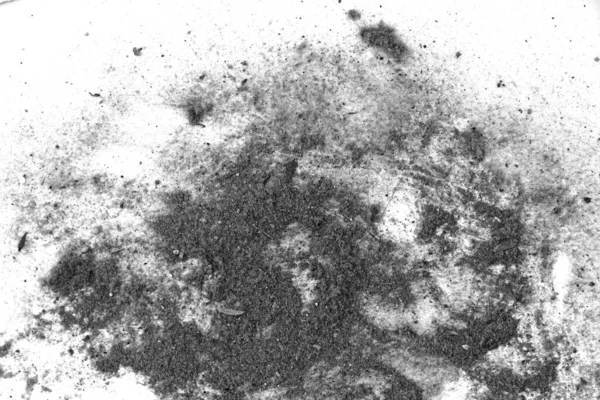 Black trash, dust, dirt isolated on a white background closeup. texture of garbage from a vacuum cleaner