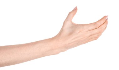 Beyaz arka planda, beyaz tenli bir kadın el hareketi bir şey tutar ya da alır, verir. Kadın elleri farklı jestler gösteriyor.