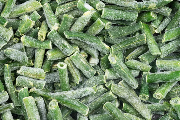 冻坏了的绿豆纹理背景 冰豆背景的食物纹理 未煮熟蔬菜 — 图库照片