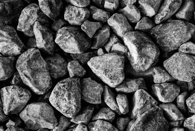 Yol taşları çakıl dokusu, inşaat için kayalar ezilmiş granit çakıl taşlarının gri arkaplanı, küçük kayalar, yakın çekim.