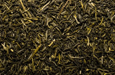 Kuru yeşil çay arkaplan dokusu, kurumuş yaprak yığını primimli Çin yeşil çayları.