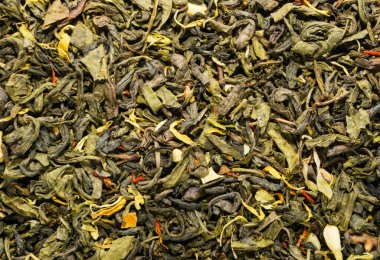 Kuru yeşil çay arkaplan dokusu, kurumuş yaprak yığını primimli Çin yeşil çayları.