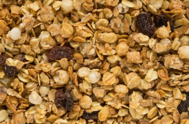 Fırınlanmış sarı müsli arka plan, mısır gevreği dokusu yakın çekim