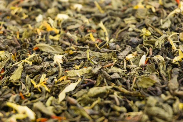 Kuru yeşil çay arkaplan dokusu, kurumuş yaprak yığını primimli Çin yeşil çayları.