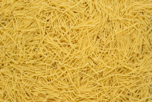 Tagliatelle Secche Consistenza Fondo Pasta Gialla Piccoli Vermicelli Maccheroni Cucina — Foto Stock