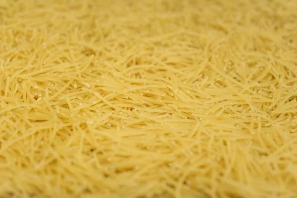 Tagliatelle Secche Consistenza Fondo Pasta Gialla Piccoli Vermicelli Maccheroni Cucina — Foto Stock