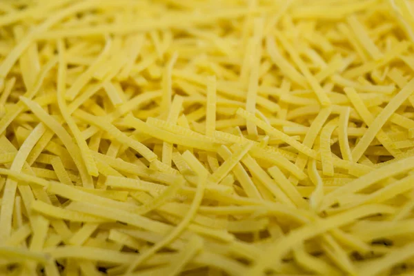 Tagliatelle Secche Consistenza Fondo Pasta Gialla Piccoli Vermicelli Maccheroni Cucina — Foto Stock