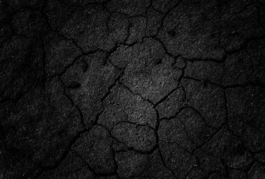 Siyah çatlamış gri toprak dokusu arka plan, koyu ve doğranmış gri toprak, eski çatlak karanlık zemin, yakın plan, erozyon