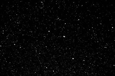 Siyah zemin üzerinde kaotik beyaz bokeh, ışık lekeleri dokusu, soyutlama, düşen kar