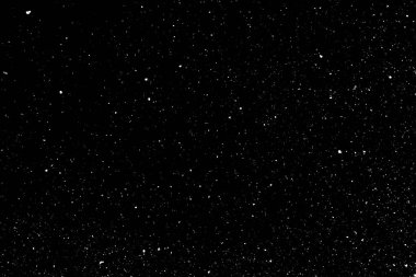 Siyah zemin üzerinde kaotik beyaz bokeh, ışık lekeleri dokusu, soyutlama, düşen kar