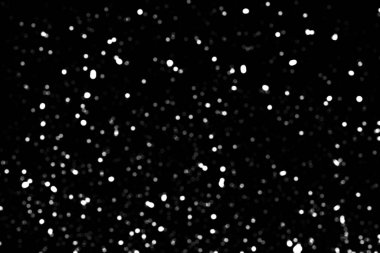 Siyah zemin üzerinde kaotik beyaz bokeh, ışık lekeleri dokusu, soyutlama, düşen kar