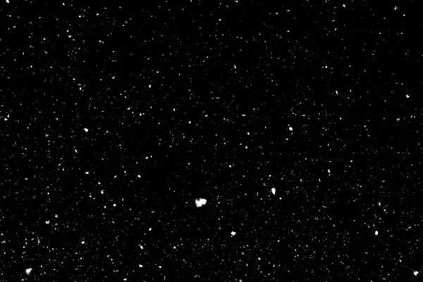 Siyah zemin üzerinde kaotik beyaz bokeh, ışık lekeleri dokusu, soyutlama, düşen kar