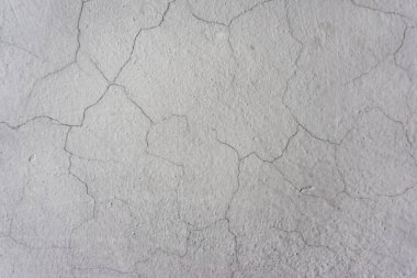 Eski beyaz duvar arkaplan dokusu. Çatallı Stucco. yok olmuş yüzey. çatlak alçı