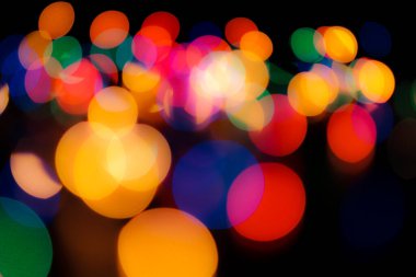 Soyut renkli, odaklanmış dairesel fakül. Bokeh bulanık renk ışığı arka planı kullanabilir. Yeni yıl Bokeh feshi