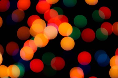 Soyut renkli, odaklanmış dairesel fakül. Bokeh bulanık renk ışığı arka planı kullanabilir. Yeni yıl Bokeh feshi