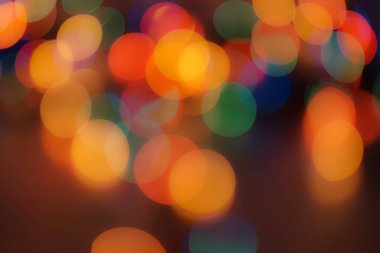 Soyut renkli, odaklanmış dairesel fakül. Bokeh bulanık renk ışığı arka planı kullanabilir. Yeni yıl Bokeh feshi