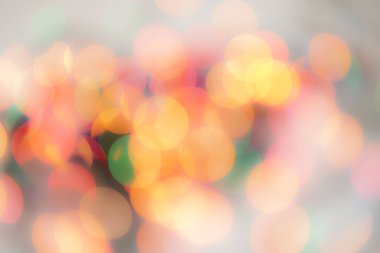 Soyut renkli, odaklanmış dairesel fakül. Bokeh bulanık renk ışığı arka planı kullanabilir. Yeni yıl Bokeh feshi