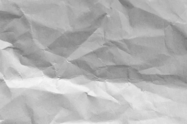 White crumpled wrapping paper background, texture of grey wrinkled of old vintage paper, creases on the surface of gray paper