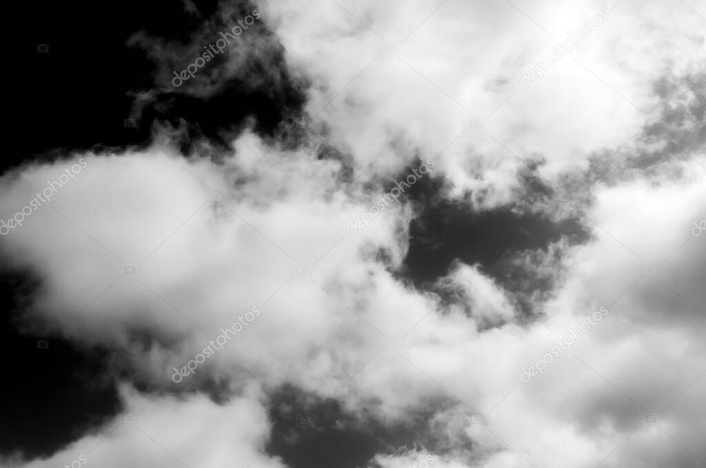 clouds in the sky black and white clouds in the sky black and white. clouds on a black background