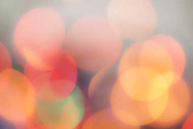 Soyut renkli, odaklanmış dairesel fakül. Bokeh bulanık renk ışığı arka planı kullanabilir. Yeni yıl Bokeh feshi