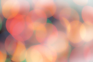 Soyut renkli, odaklanmış dairesel fakül. Bokeh bulanık renk ışığı arka planı kullanabilir. Yeni yıl Bokeh feshi
