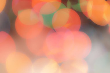 Soyut renkli, odaklanmış dairesel fakül. Bokeh bulanık renk ışığı arka planı kullanabilir. Yeni yıl Bokeh feshi