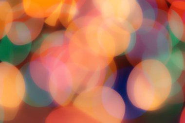 Soyut renkli, odaklanmış dairesel fakül. Bokeh bulanık renk ışığı arka planı kullanabilir. Yeni yıl Bokeh feshi