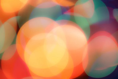 Soyut renkli, odaklanmış dairesel fakül. Bokeh bulanık renk ışığı arka planı kullanabilir. Yeni yıl Bokeh feshi