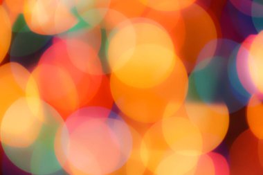 Soyut renkli, odaklanmış dairesel fakül. Bokeh bulanık renk ışığı arka planı kullanabilir. Yeni yıl Bokeh feshi