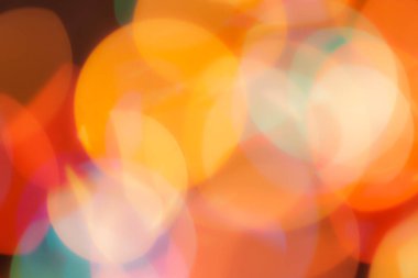 Soyut renkli, odaklanmış dairesel fakül. Bokeh bulanık renk ışığı arka planı kullanabilir. Yeni yıl Bokeh feshi