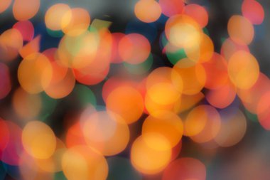 Soyut renkli, odaklanmış dairesel fakül. Bokeh bulanık renk ışığı arka planı kullanabilir. Yeni yıl Bokeh feshi