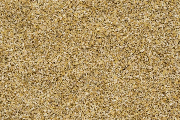 Crushed Wheat Groats Background Texture — Stock Photo, Image