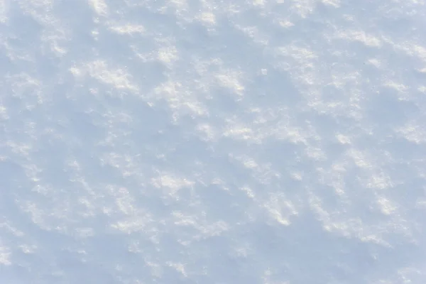 白い雪の質感と青いトーン — ストック写真