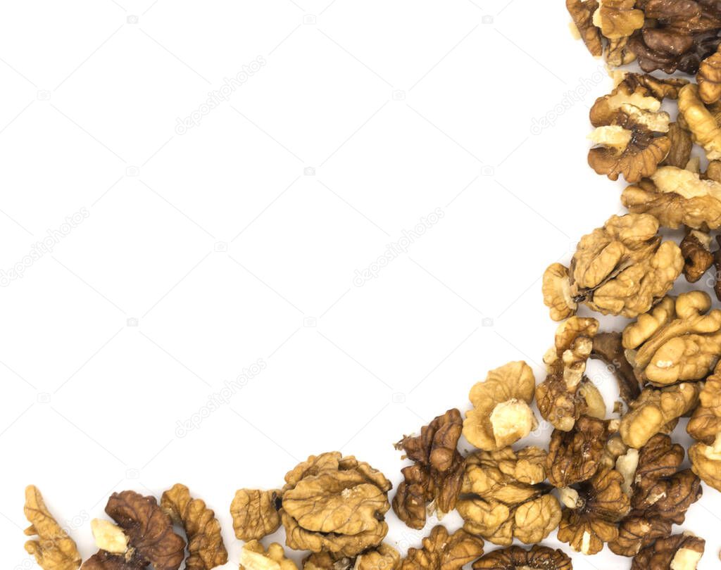 Peeled walnut on white background