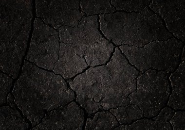 Siyah çatlamış zemin dokusu arka planı
