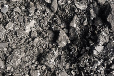 Siyah taş doğal kömür arkaplan dokusu, gri kömür dokusu, yukarıdan görüş, kömür yığını, karlı gri donmuş kömür