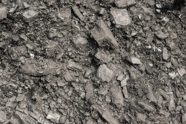 Siyah taş doğal kömür arkaplan dokusu, gri kömür dokusu, yukarıdan görüş, kömür yığını, karlı gri donmuş kömür