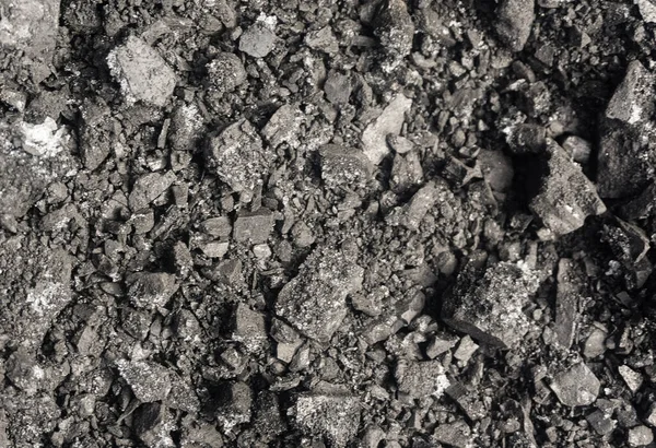 Siyah taş doğal kömür arkaplan dokusu, gri kömür dokusu, yukarıdan görüş, kömür yığını, karlı gri donmuş kömür