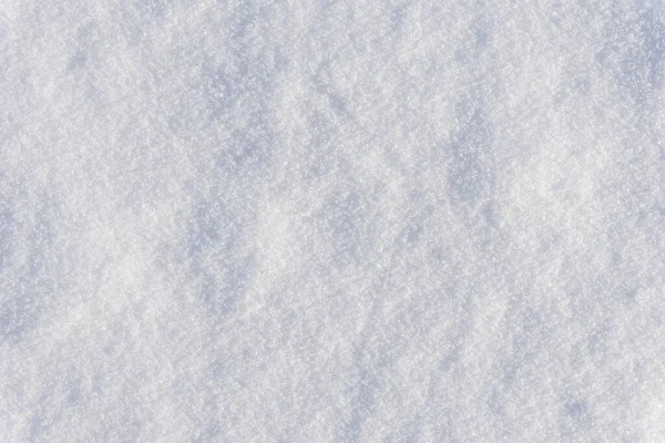 白いきれいな光沢のある雪の背景のテクスチャ 新鮮な雪のテクスチャ 雪の表面のクローズアップ — ストック写真
