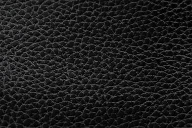 Siyah doğal deri desenli makro. Koyu renkli bir madde, duvar kağıdı arkaplan