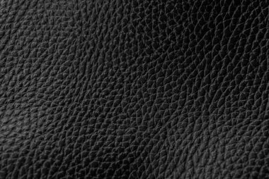 Siyah doğal deri desenli makro. Koyu renkli bir madde, duvar kağıdı arkaplan