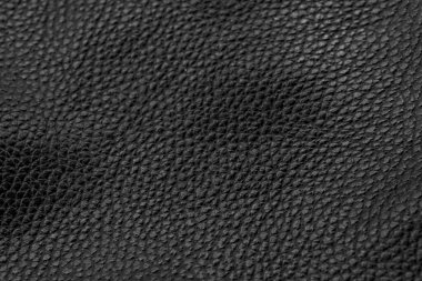 Siyah doğal deri desenli makro. Koyu renkli bir madde, duvar kağıdı arkaplan