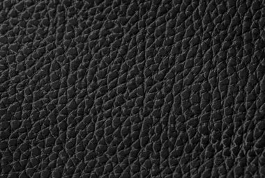 Siyah doğal deri desenli makro. Koyu renkli bir madde, duvar kağıdı arkaplan