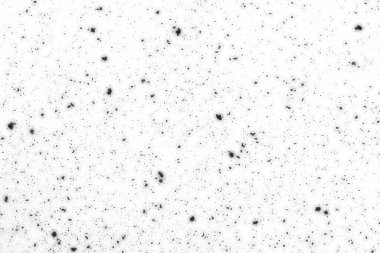 Beyaz arkaplanda kaotik siyah boke, koyu lekeler desen, soyut bulanık kar, bulanık kar