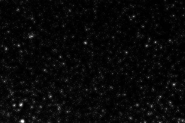 Siyah arkaplanda kaotik beyaz bokeh, ışık lekeleri dokusu, soyut bulanıklık, düşen kar, yıldızlı gökyüzü