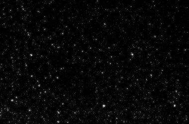 Siyah arkaplanda kaotik beyaz bokeh, ışık lekeleri dokusu, soyut bulanıklık, düşen kar, yıldızlı gökyüzü