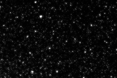 Siyah arkaplanda kaotik beyaz bokeh, ışık lekeleri dokusu, soyut bulanıklık, düşen kar, yıldızlı gökyüzü