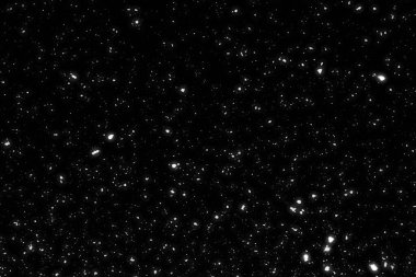 Siyah arkaplanda kaotik beyaz bokeh, ışık lekeleri dokusu, soyut bulanıklık, düşen kar, yıldızlı gökyüzü